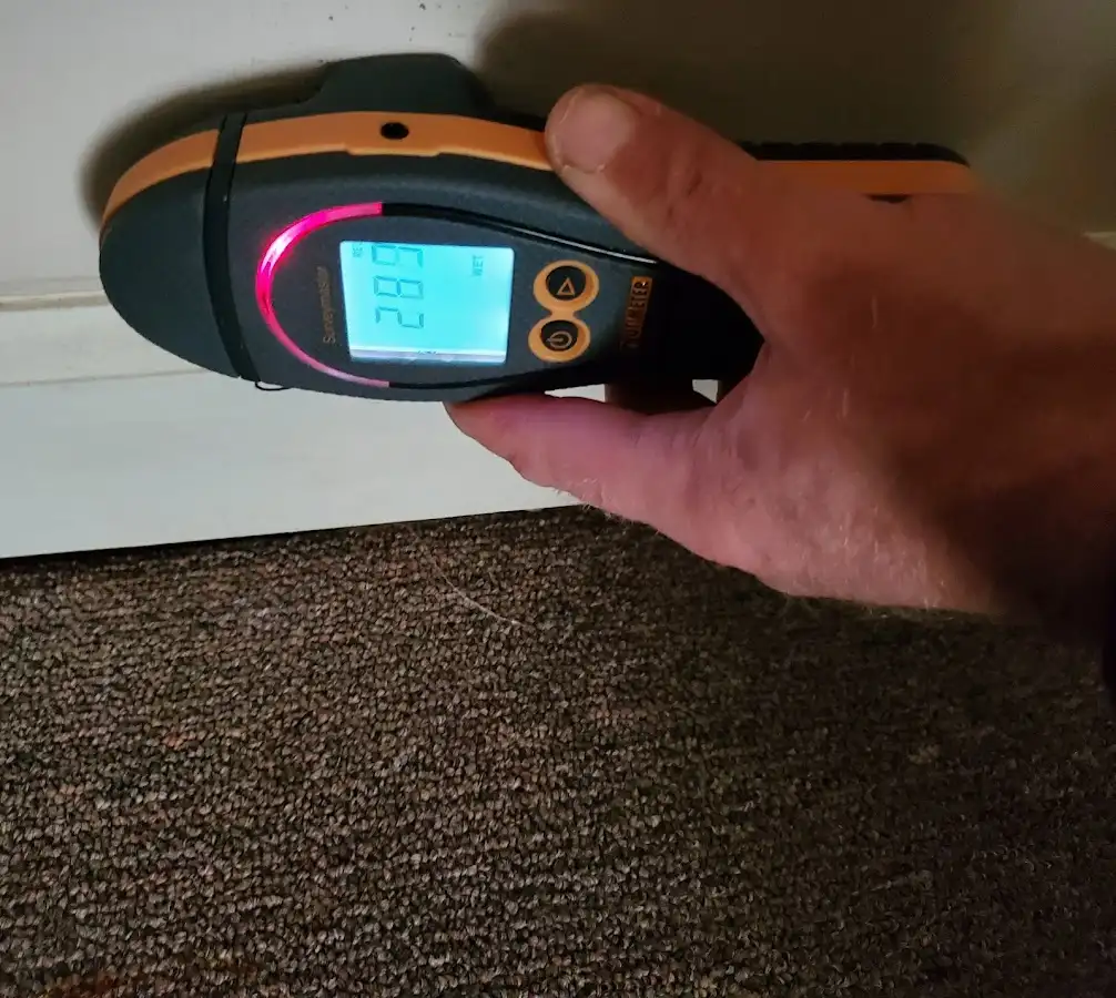 Moisture detection at baseboard during Sewage Cleanup & Sanitation in Dunwoody